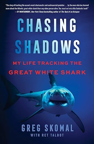 Cover of the book Chasing Shadows, with a great white shark underwater.