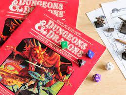 Dungeons and Dragons guidebook with dice and figurines