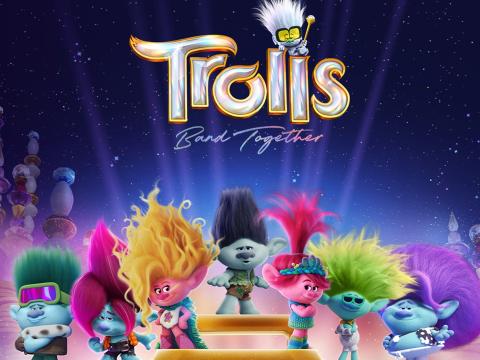 Movie poster for Trolls: Band Together. Multicolored Trolls characters pose on a stage.