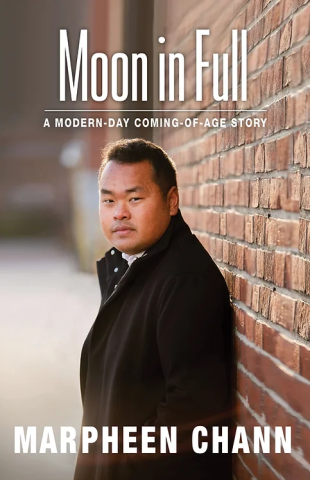 Book cover image of 'Moon in Full: A Modern-Day Coming-of-Age Story' by Marpheen Chann, which has both the title and author name in white text, at the top and bottom, with a full-cover photo of the author in a black coat, leaning against a brick wall.