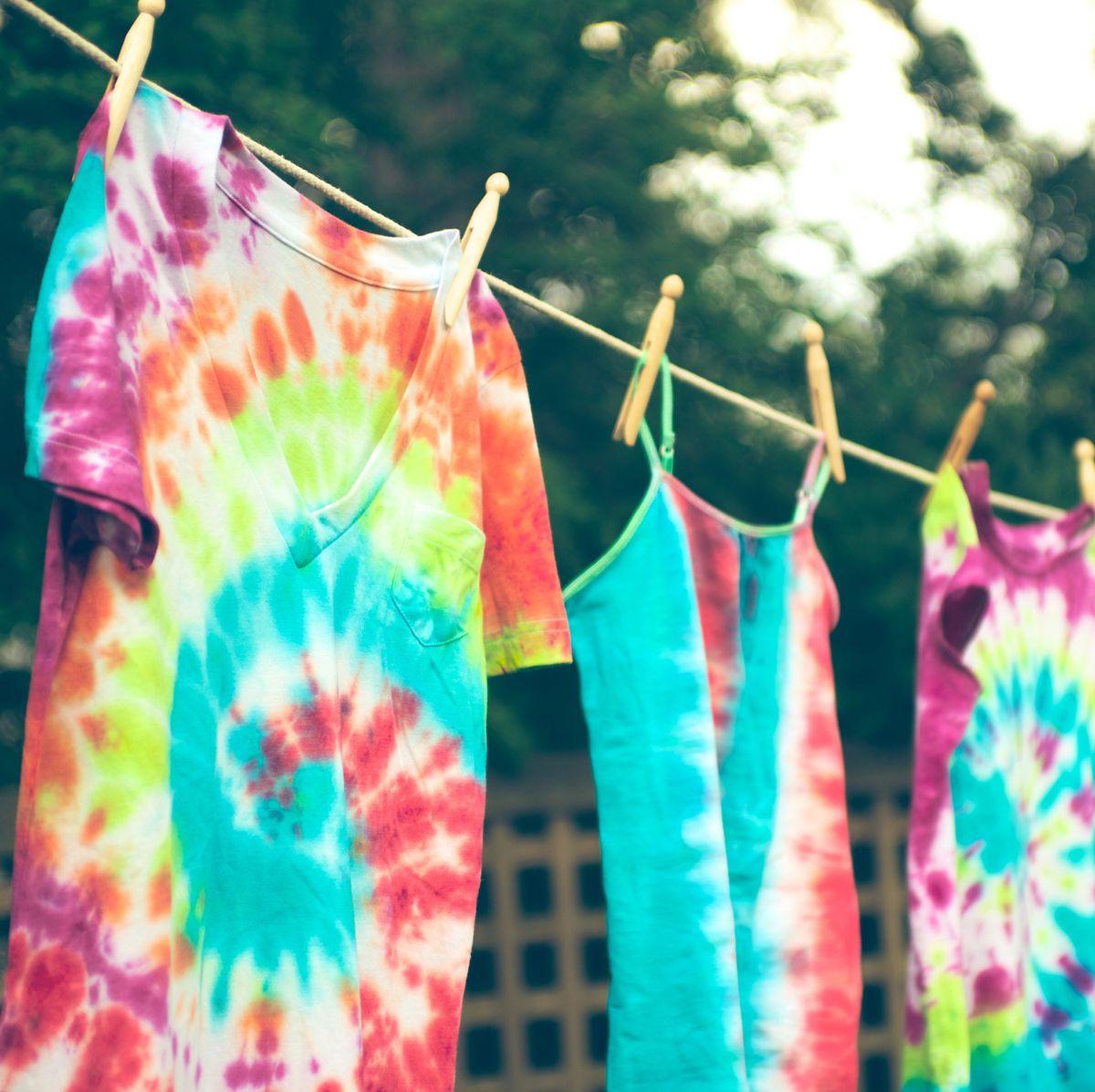 Colorful tie-dye T-shirts hanging on a clothesline