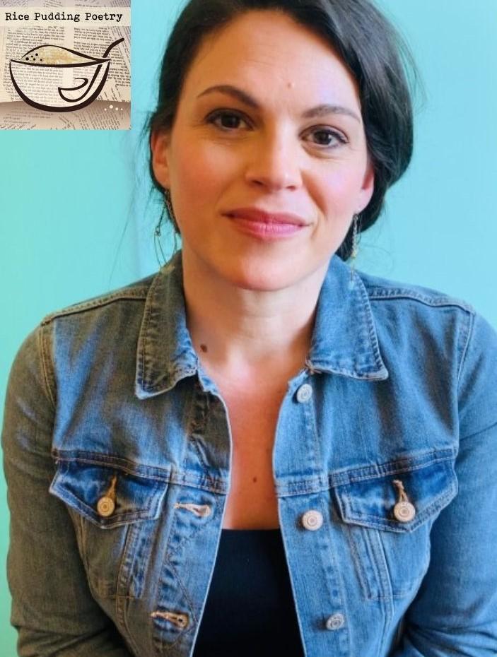 Photo of Meghan Sterling from the chest up, wearing a denim jacket over a black shirt. She is smiling toward the camera, positioned in front of a light blue wall. The logo for Rice Pudding Poetry (a cartoon bowl of rice pudding in front of a page of text, in beiges and browns) is superimposed in the top left corner, next to Meghan's face.