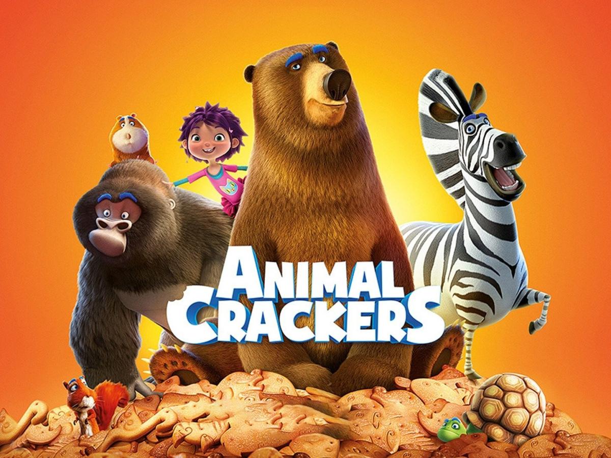 The characters of Animal Crackets including a brown bear, zebra, and gorilla stand together against an orange background.